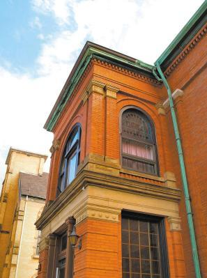 68 Carleton Street is a c.1840 mansion that has been added to over the years through jutting brick bays, carved stone ornament and a circular sunroom facing the harbour