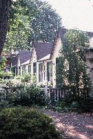 Cabbagetown's famous Wellesley Cottages, on a back 