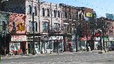 Buildings on Spadina Avenue, neglected by owner/speculators