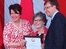 Jane Irwin receives her Queens Diamond Jubilee Medal from Burlington MPP Jane McKenna and Burlington MP Mike Wallace during a ceremony last Canada Day (July 1). Richard Bachmann - Special to Post