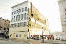 The Wells Building was added to the National Register of Historic Places in 1986. It was last used about 30 years ago as an Armed Forces recruiting facility.