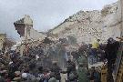 Moroccan rescue and residents remove rubble after the Lalla Khenata mosque minaret collapsed in the old Bab el Bardiyine neighbourhood of Meknes February 19, 2010. The four centuries-old mosque minaret collapsed in Morocco on Friday, killing at least 38 p