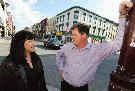 Erik Hanson and Debra Soule of the city Arts and Heritage division, chat opposite the Henthorn block Wednesday at the northeast intersection of George and Hunter Streets downtown. Clifford Skarstedt/Peterborough Examiner/QMI Agency