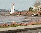 The lighthouse sits on the edge of a residential neighbourhood, next to Victoria Park. (CBC) 