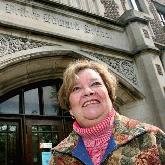 Pat Malicki in Front of Prince Edward School