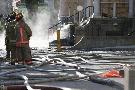 Water pours down the front steps as a three alarm fire claims an old mansion of the West side of Jarvis Street just south of Carlton.