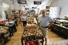 Grant Genzlinger stands inside his Mill Market in the Hawley Silk Mill. Michael J. Mullen / Staff Photographer