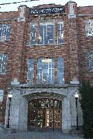 Kingston Collegiate Vocational Institute. The projecting limestone entrance to KCVI highlights the Modern Gothic, or Beaux-Arts Gothic  also known as Collegiate Gothic  architectural style popular with the Ministry of Education